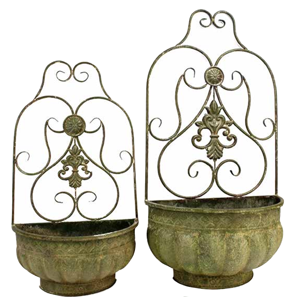 Two decorative metal planters with ornate scrollwork wire backdrops and textured greenish-brown basins, shown on a plain white background.
