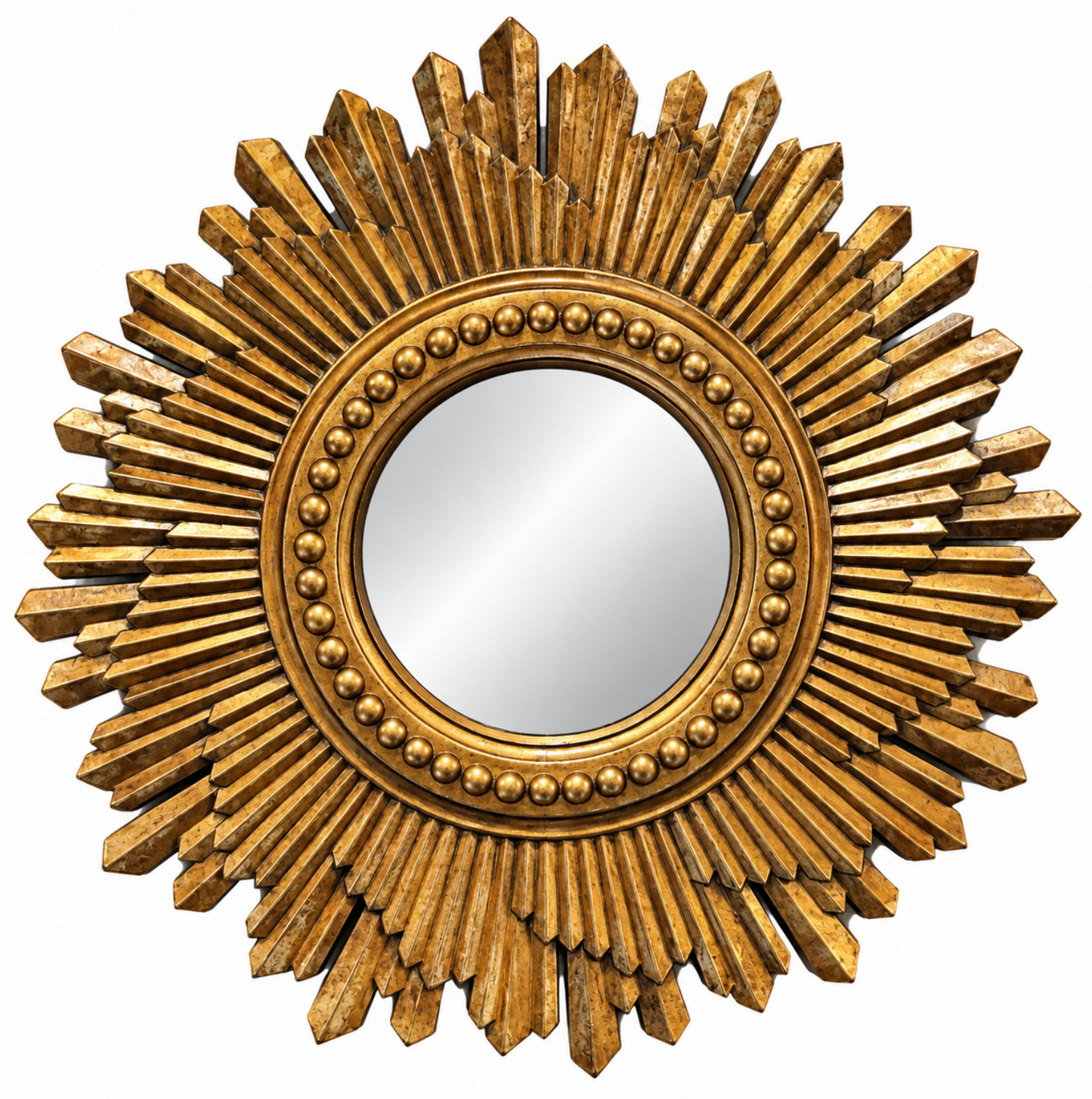 A round decorative wall mirror with a sunburst frame in a distressed gold finish, featuring radiating rays and a beaded inner border.