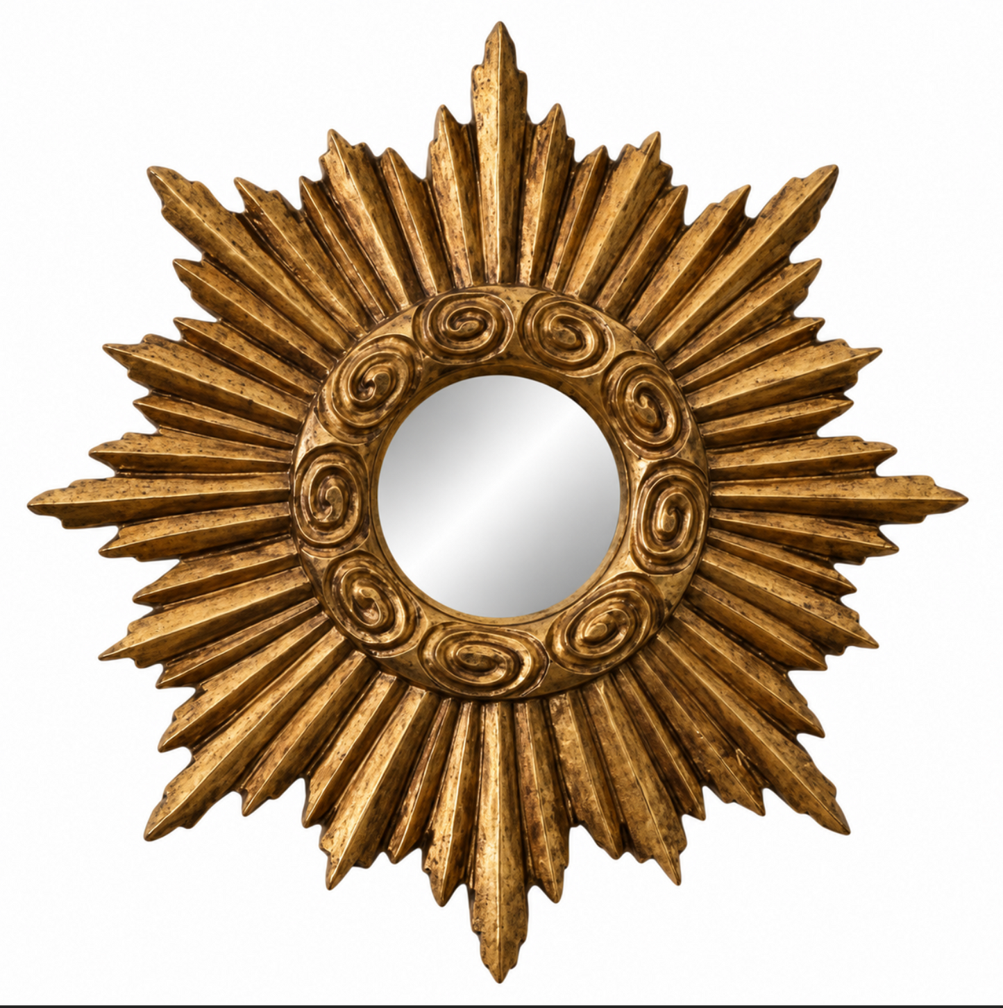 A gold sunburst wall mirror with ornate carved details around the circular reflective center, shown against a plain white background.