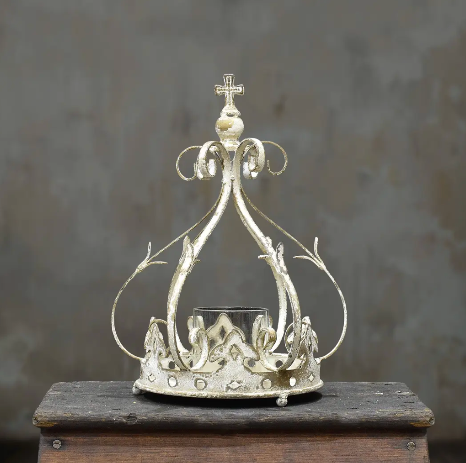 Tall iron crown candle holder with cross finial, scrollwork branches and glass votive in antique silver patina