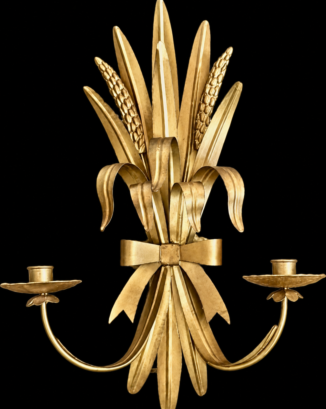 Gold-toned thin-metal candle sconce with wheat stems, ribbon details and two candle holders