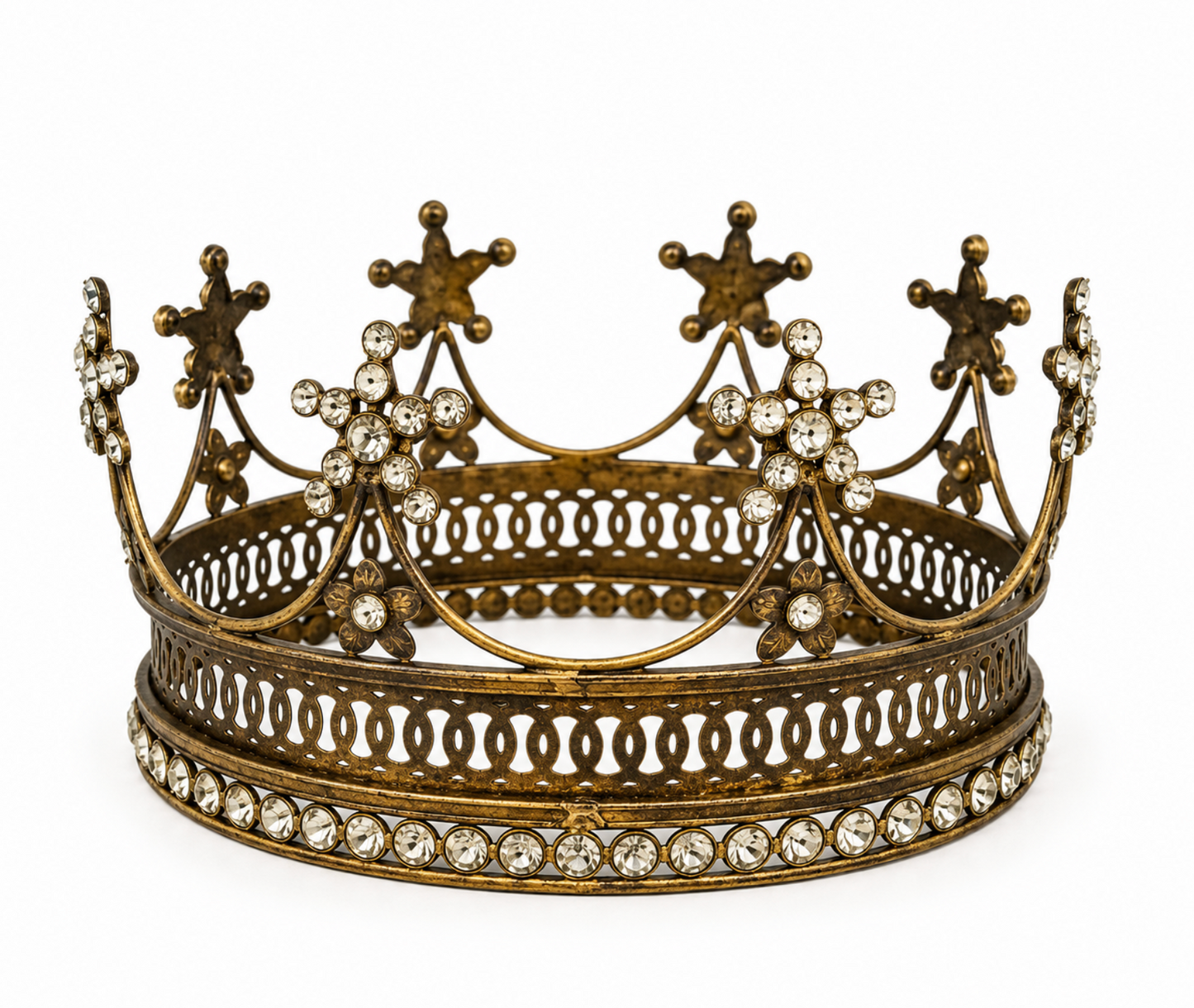 Large aged gold-toned crown with pointed crest details and clear faceted embellishments