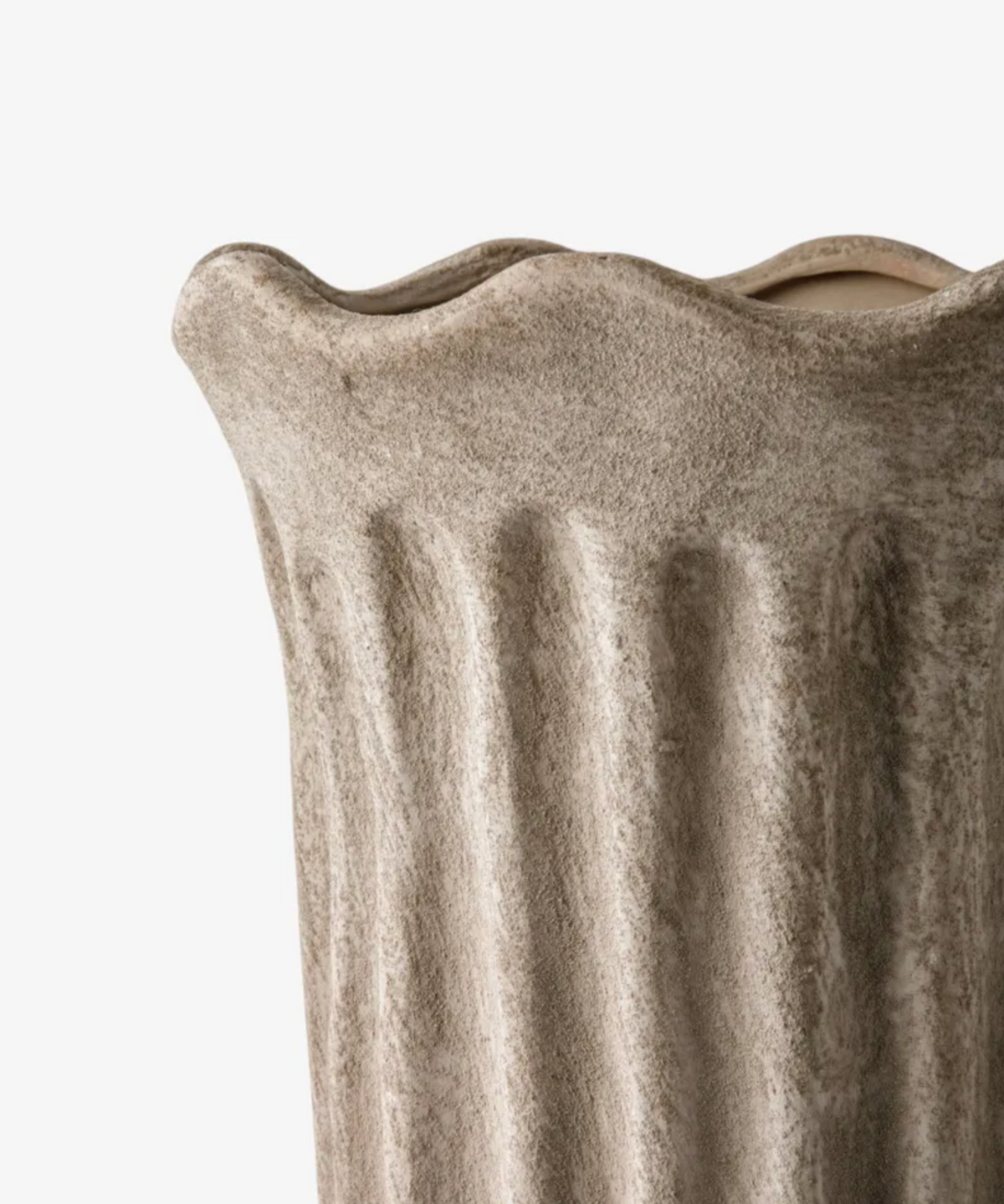 Close view of the Fluted Vase in sand terracotta showing its sculpted panels and undulating rim