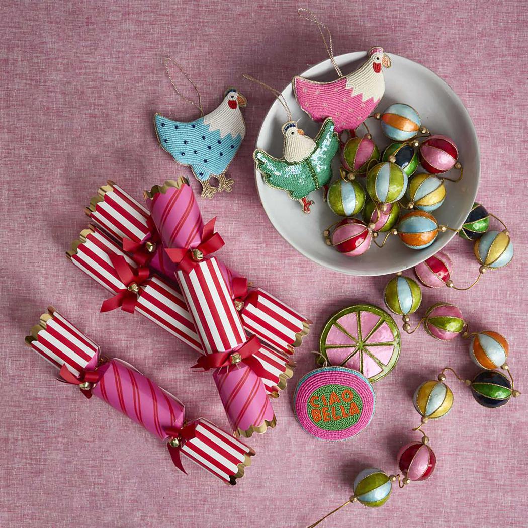 Red and pink striped Christmas crackers