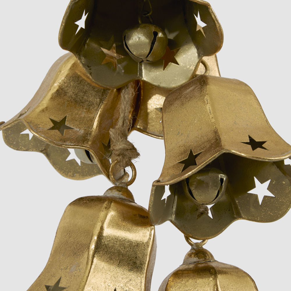 Close-up of the gold flower bells showing scalloped edges, star cut-outs and inner bells