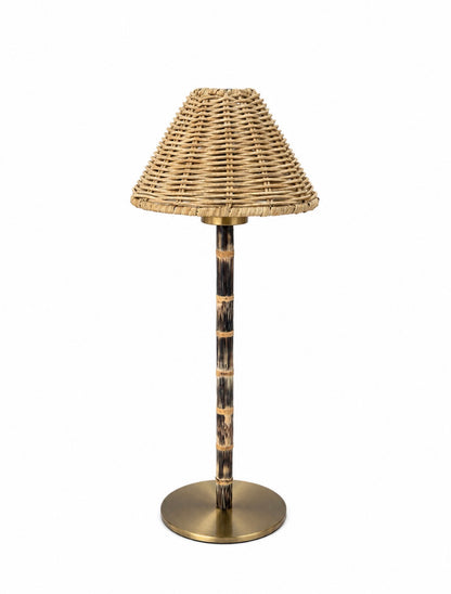 Cordless rechargeable lamp with bamboo pole, brass base and woven rattan shade