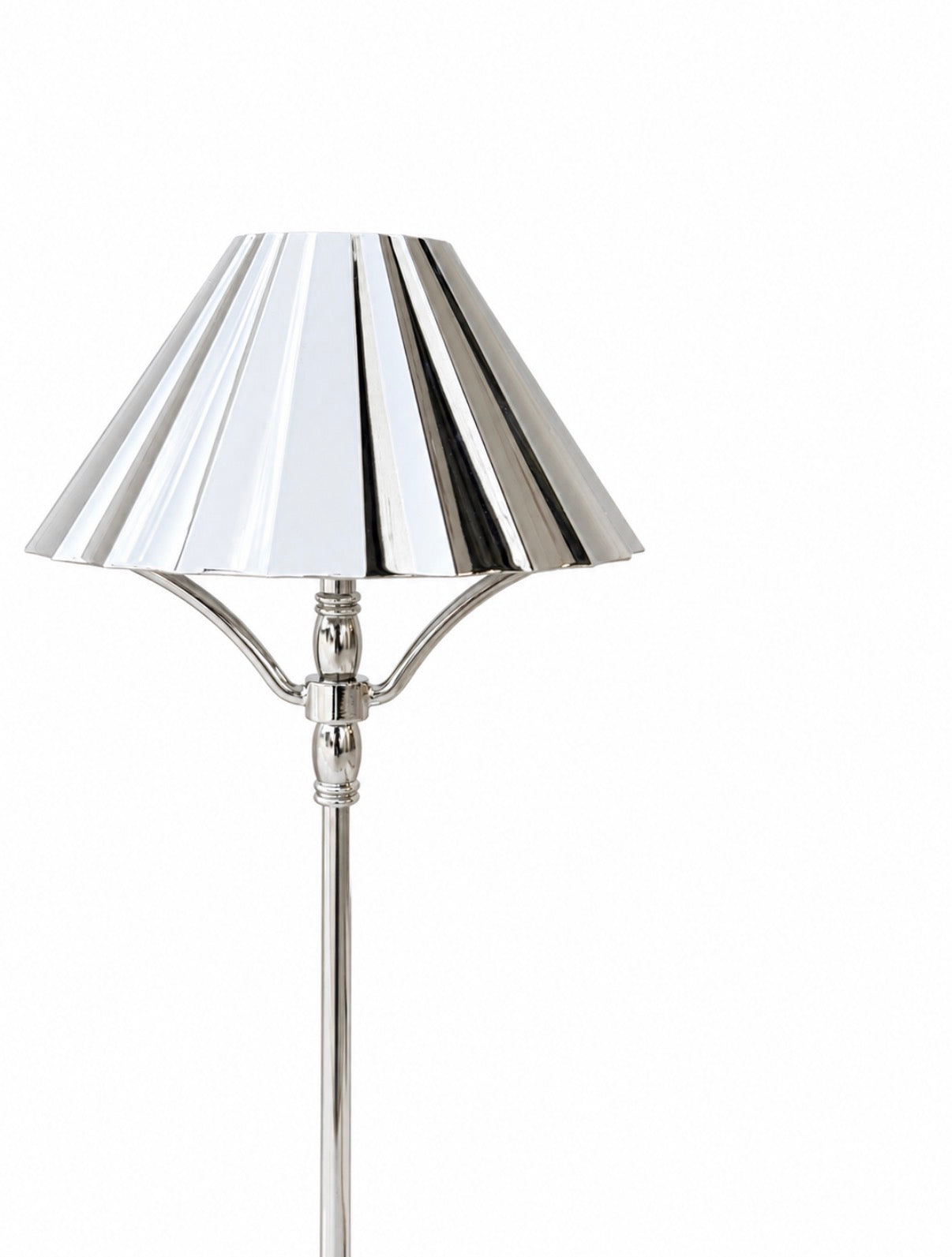 Full view of cordless rechargeable chrome lamp with round base