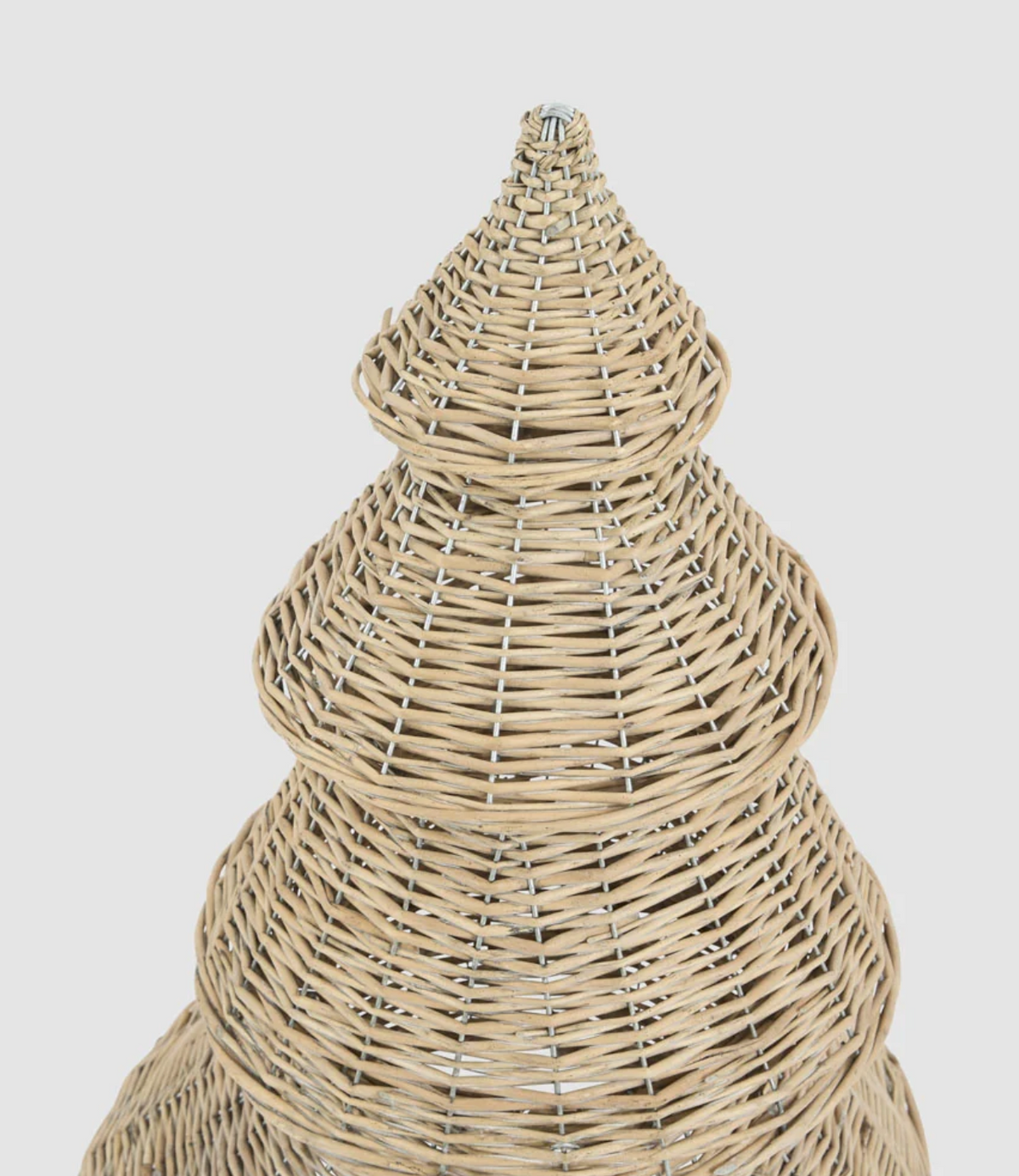 Close-up of the tiered woven willow branches of the large Christmas tree