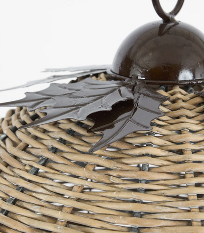 Close-up of dark leaf-shaped crown on large willow bell