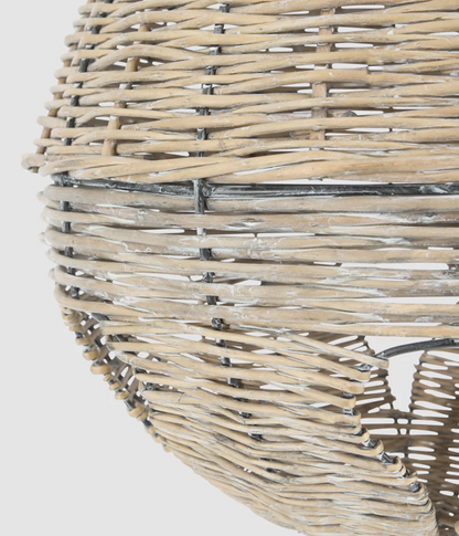 Close-up of woven willow and cut-out on large bell decoration