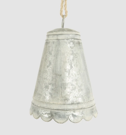 Large silver-grey zinc bell with scalloped edge and hanging cord