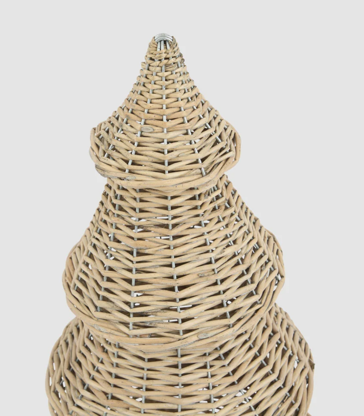 Close-up of the woven willow branches of the medium Christmas tree