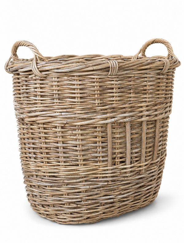 A natural woven wicker basket with two loop handles, shown on a clean white background.