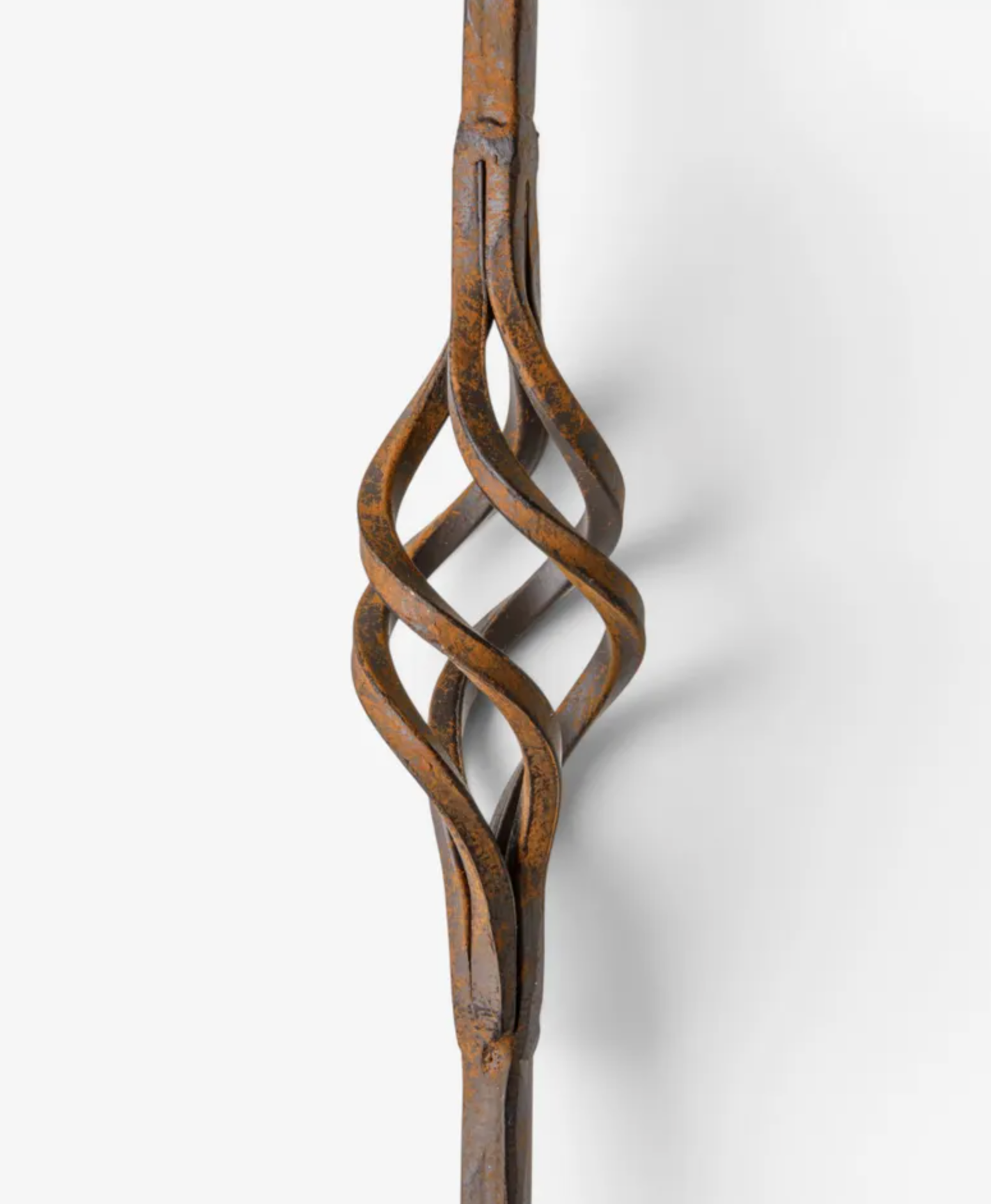 A close-up of a rustic, twisted wooden decorative wall hook or wall art piece in a warm brown finish, shown against a clean white background.