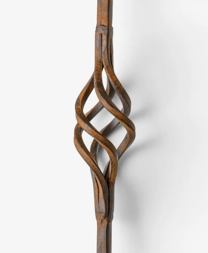 A close-up of a rustic, twisted wooden decorative wall hook or wall art piece in a warm brown finish, shown against a clean white background.