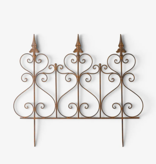 An ornate wrought iron decorative fence panel with three pointed finials and scrolled details, shown against a plain white background.