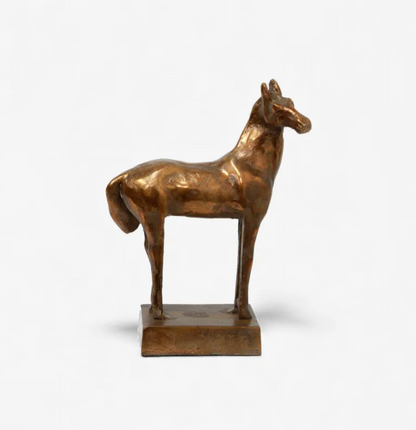 A small bronze sculpture of a standing horse on a rectangular base, photographed against a clean white background.