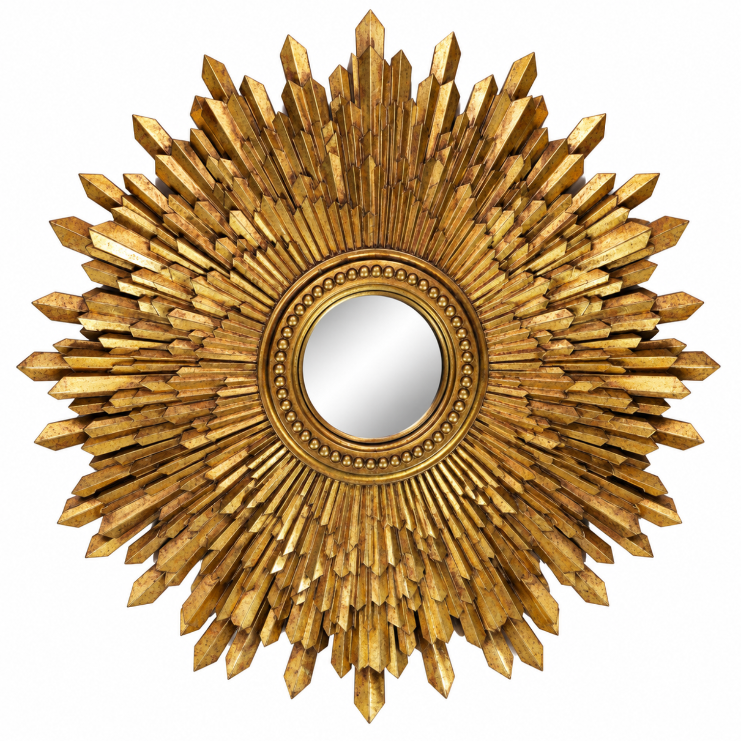 A round decorative wall mirror with an ornate sunburst frame made of many pointed gold-toned rays, shown against a plain white background.