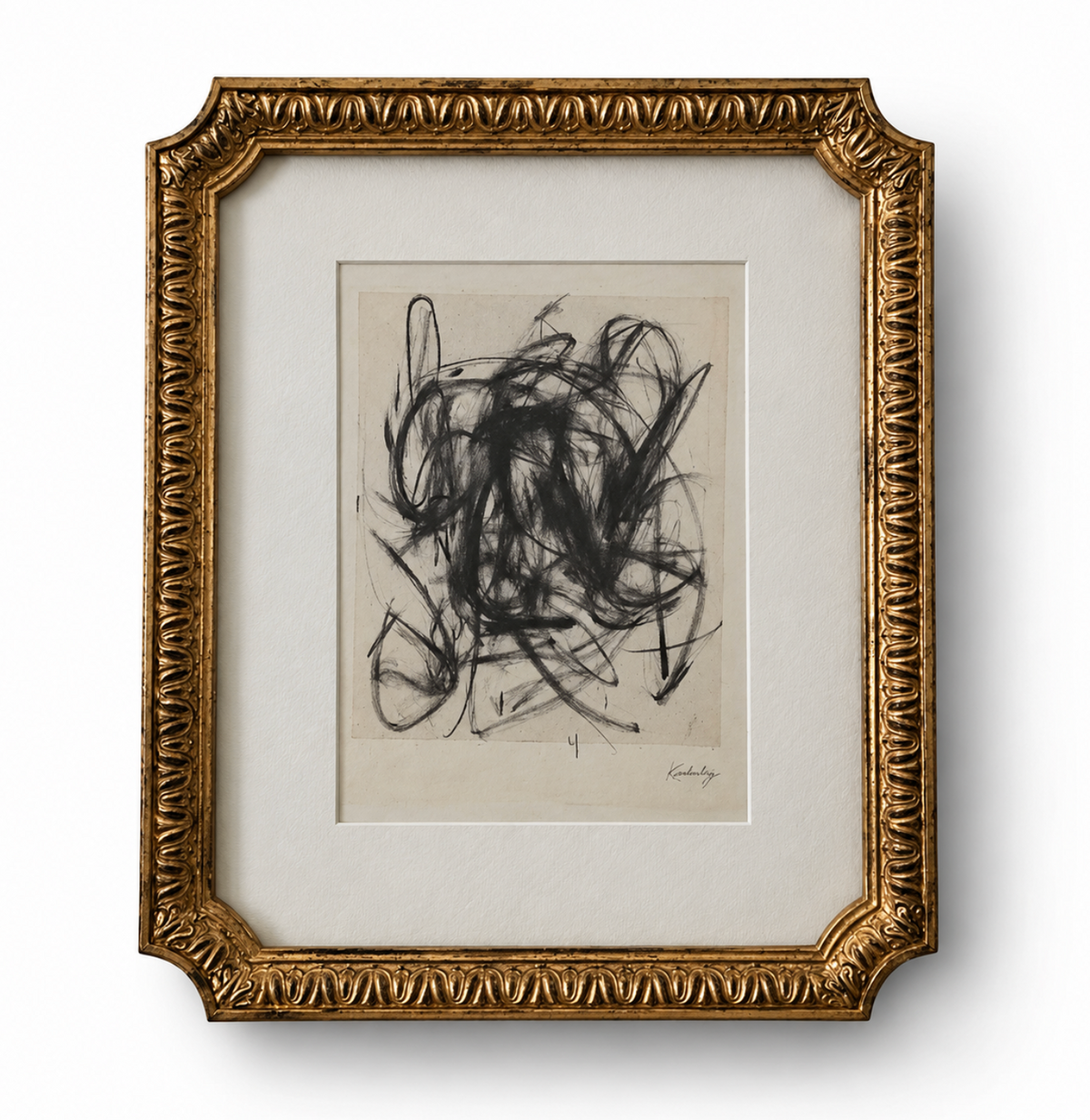 A framed abstract art print featuring black scribbled lines on a beige background, surrounded by a wide white mat and an ornate gold frame.