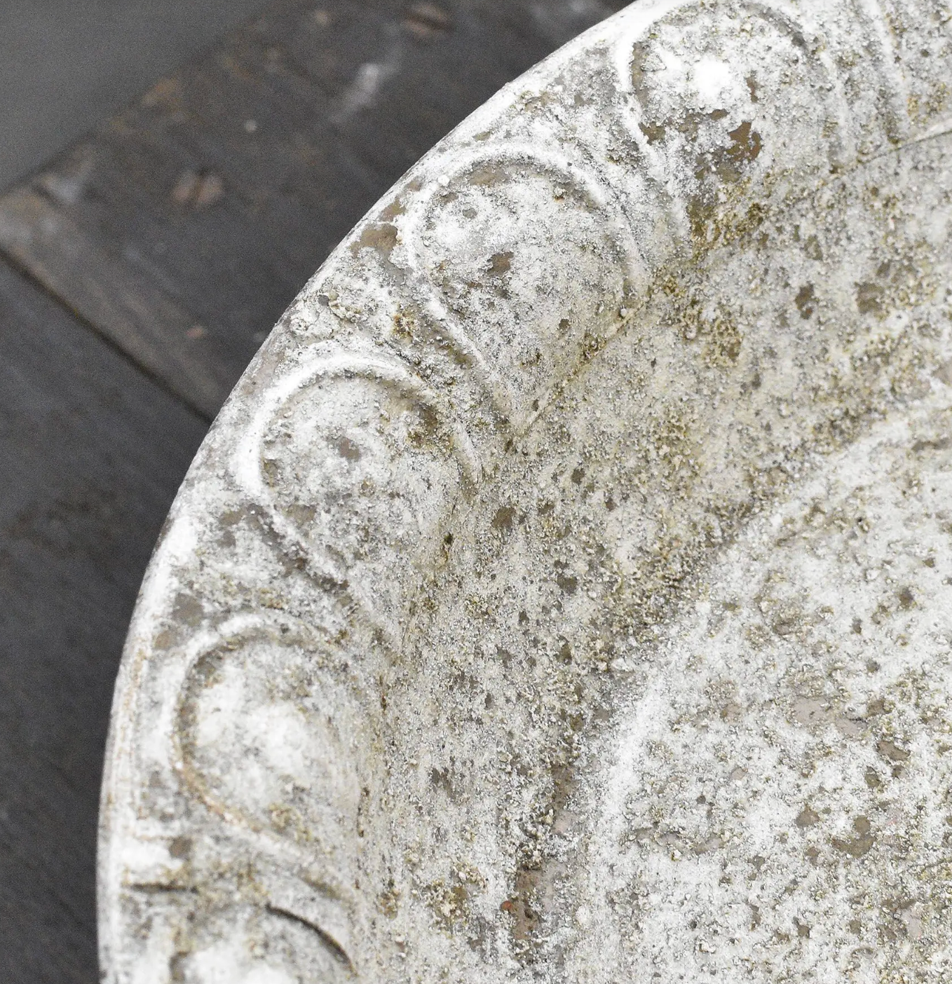 Close detail of Aria Footed Bowl rim showing embossed scrollwork and aged metal finish