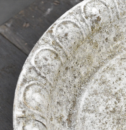 Close detail of Aria Footed Bowl rim showing embossed scrollwork and aged metal finish