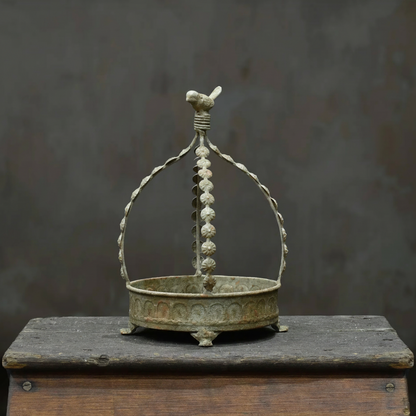 Avilia Bird Planter in Blanca finish - side profile showing embossed body and footed base