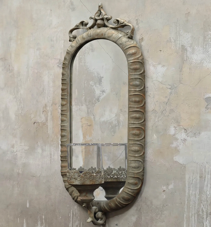 Candelero Wall Mirror Candle Sconce in Oxido finish - aged silver oval mirror frame with glass votive and decorative finial