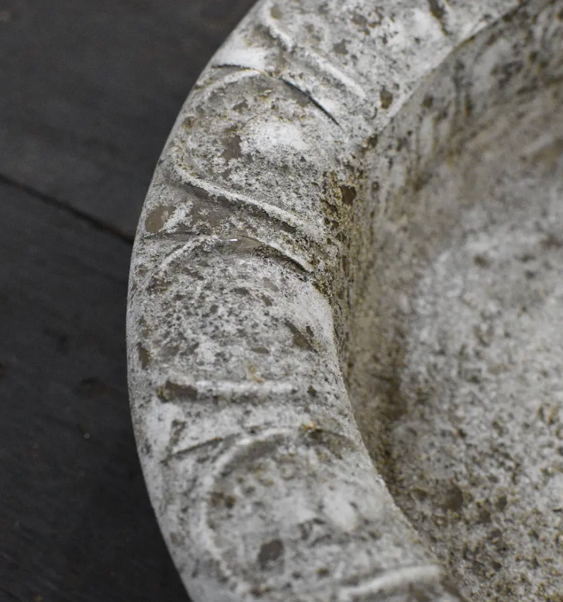 Cast iron bird dish in Blanca finish - overhead view showing shallow interior and scalloped rim