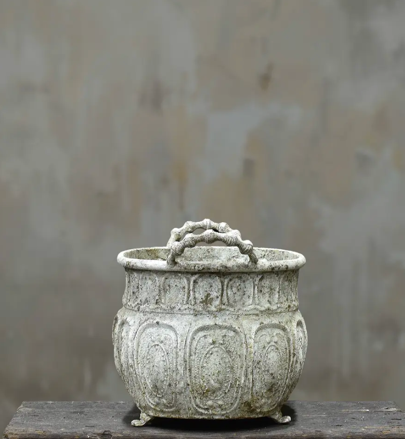 Two embossed trough planters in Blanca finish stacked showing Medium and Large size comparison