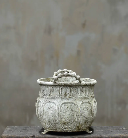 Two embossed trough planters in Blanca finish stacked showing Medium and Large size comparison