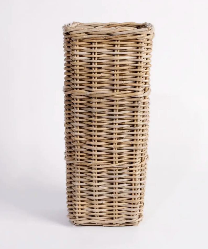 Close detail of cut-out handle and rim weave on Kubu cane umbrella stand