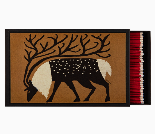 Reindeer giant matchbox open showing 150 red-tipped white matchsticks and illustrated black reindeer with ornate branching antlers on tan ground