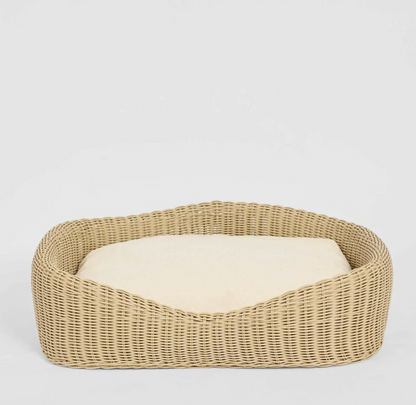 Rattan Pet Bed in natural PE rattan with cream cushion - front view