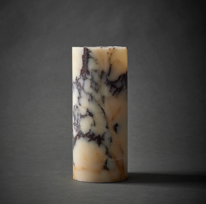 Marble effect cylindrical table lamp unlit, showing grey and cream veining
