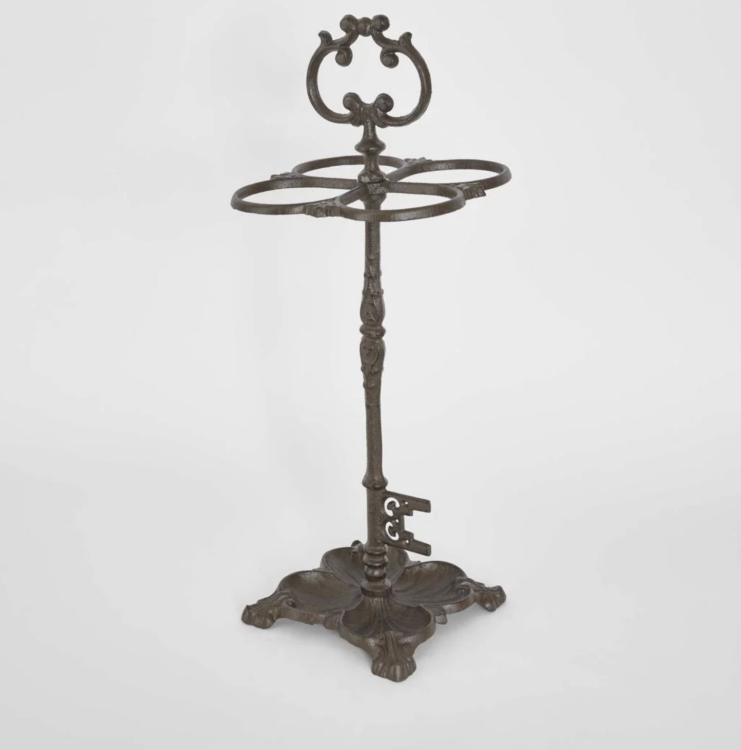 Cast Iron Umbrella Stand in dark aged finish - three quarter view