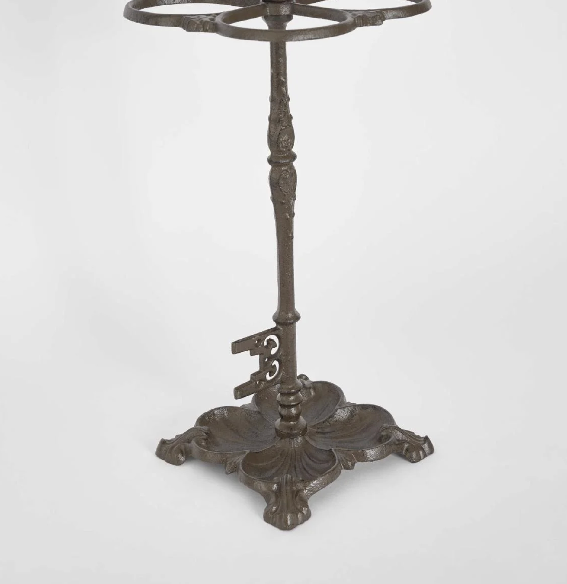 Cast Iron Umbrella Stand - close up of claw base and drip tray detail