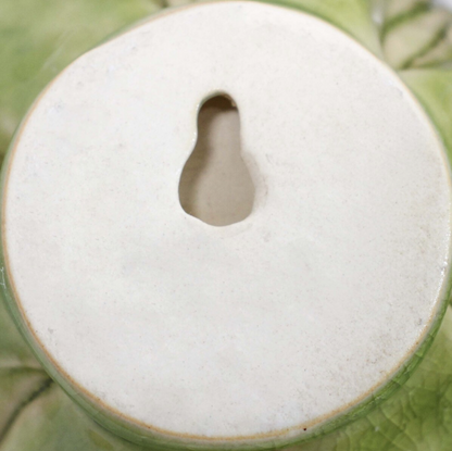 Cream ceramic wall flower keyhole wall mount on base