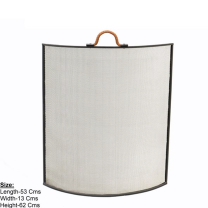 Leather handle fire screen styled beside a fireplace