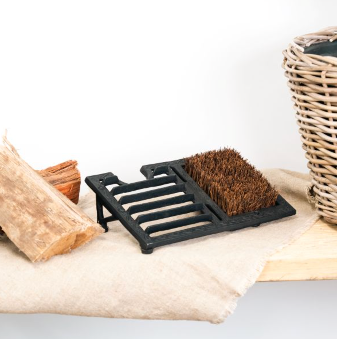 Close-up of the bristle brush and scraper on the black boot scraper