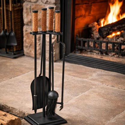 Front view of five-piece fire tool set with leather handles