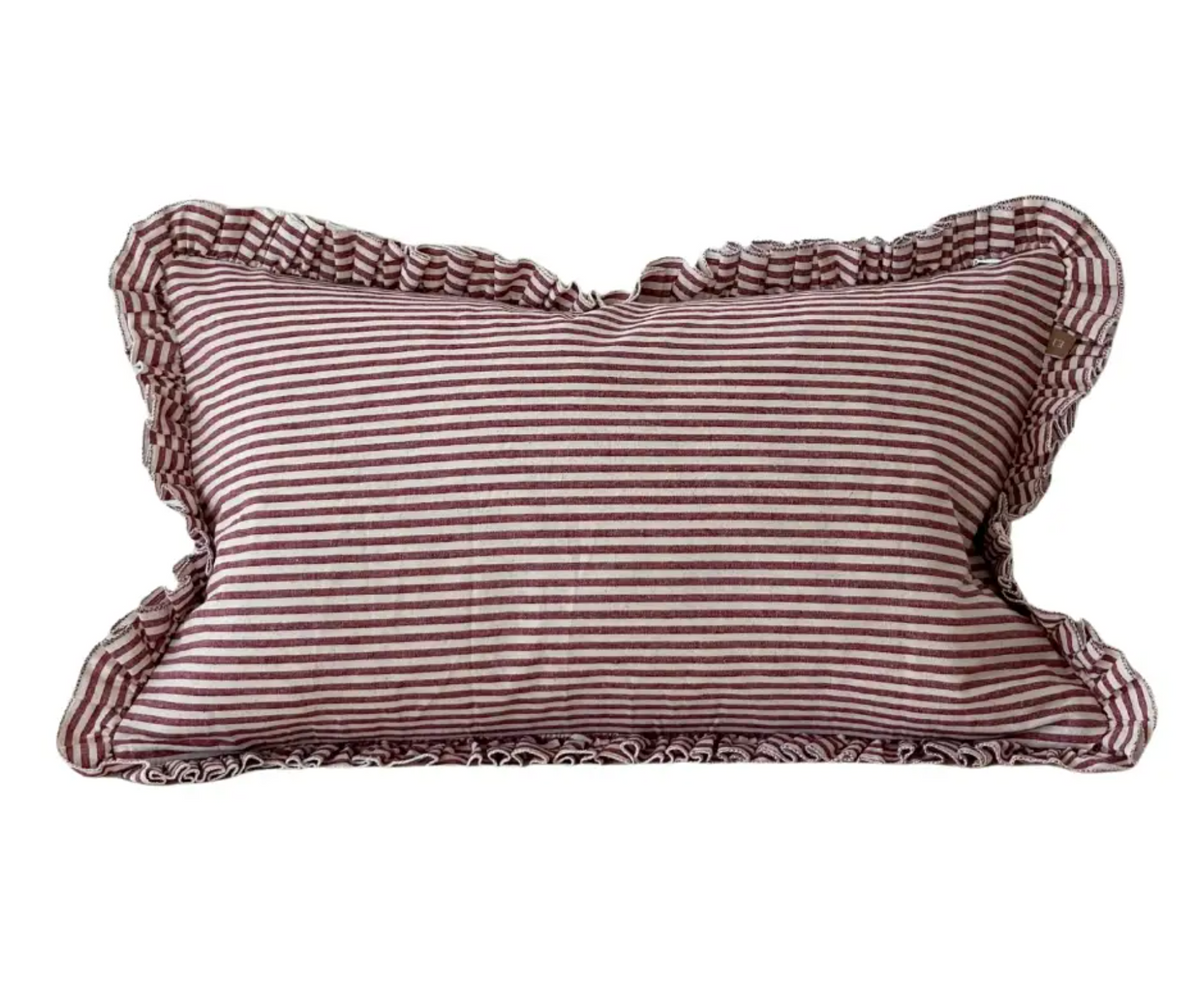 Burgundy striped rectangular ruffle cushion with feather insert on a white background