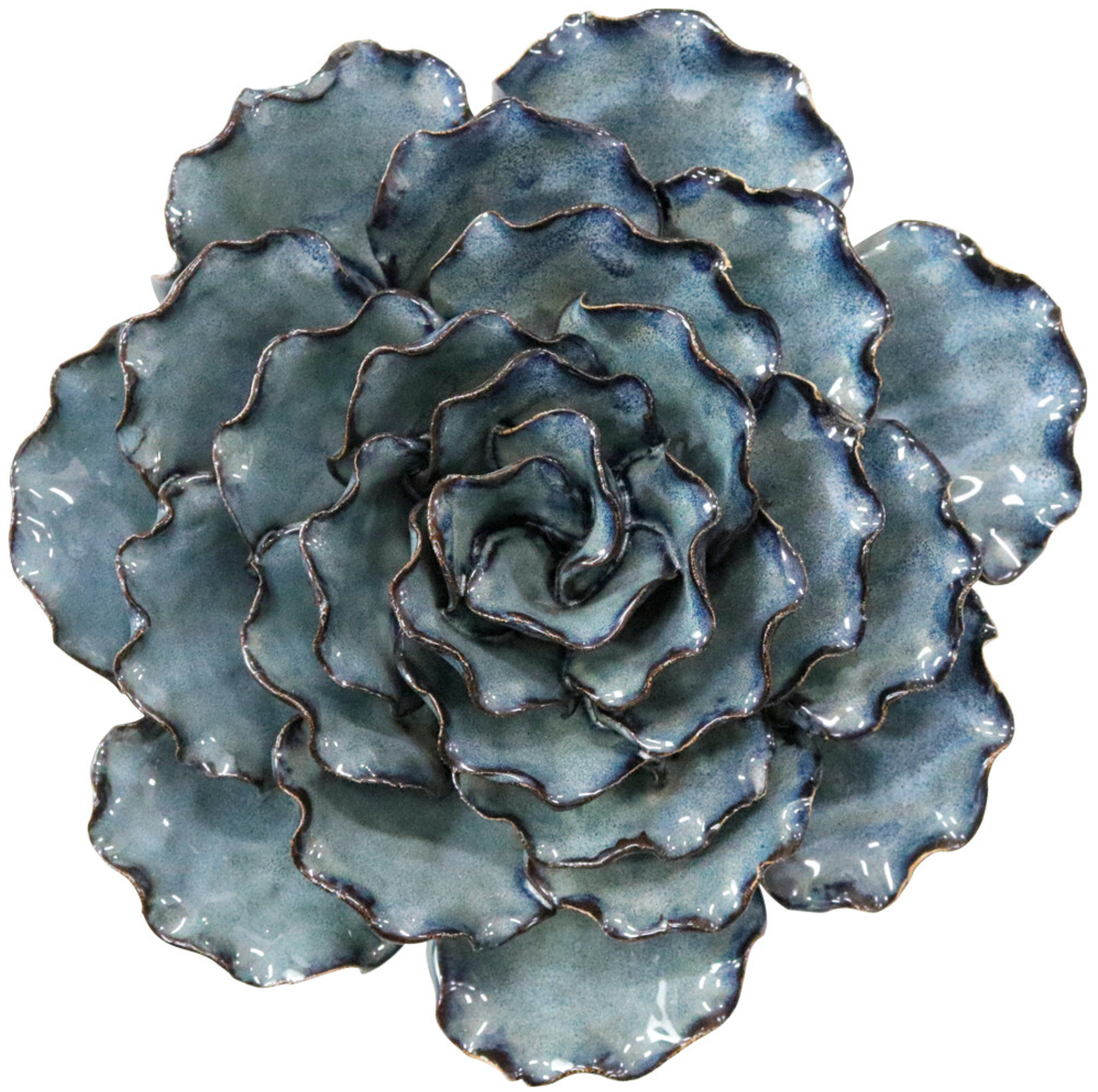 Large blue and teal ceramic ocean wall flower styled on a surface with other decorative flowers.