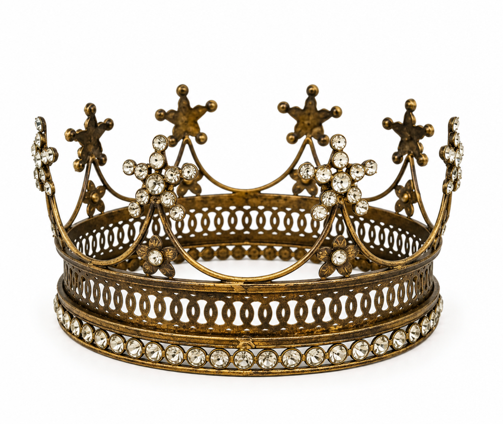 Large aged gold-toned crown with pointed crest details and clear faceted embellishments
