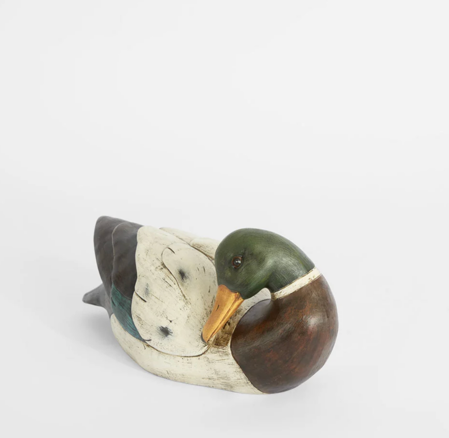 White polyresin trinket duck shown from the side
