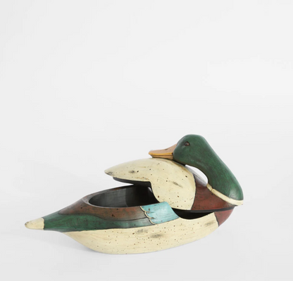 Close view of the green duck trinket box with painted detailing
