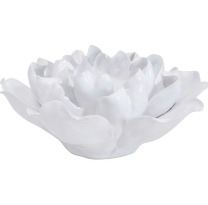 White ceramic flower-petal tealight holder with a candle shown in the centre