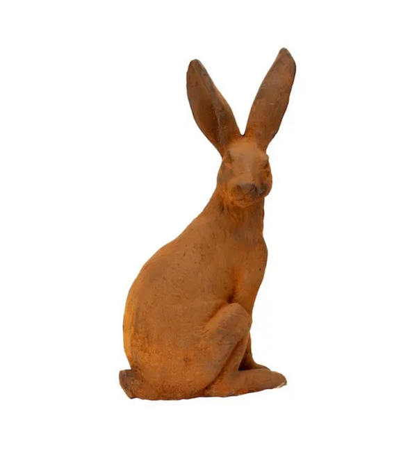 Rust-finished cast iron sitting hare with upright ears, front three-quarter view