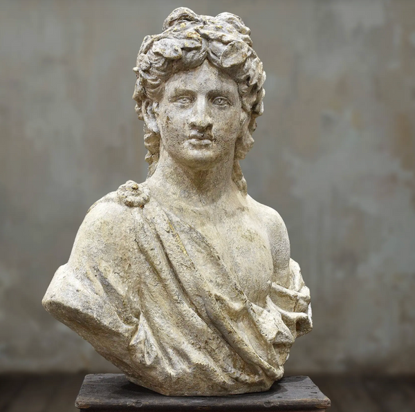Front view of classical cement bust on a display plinth