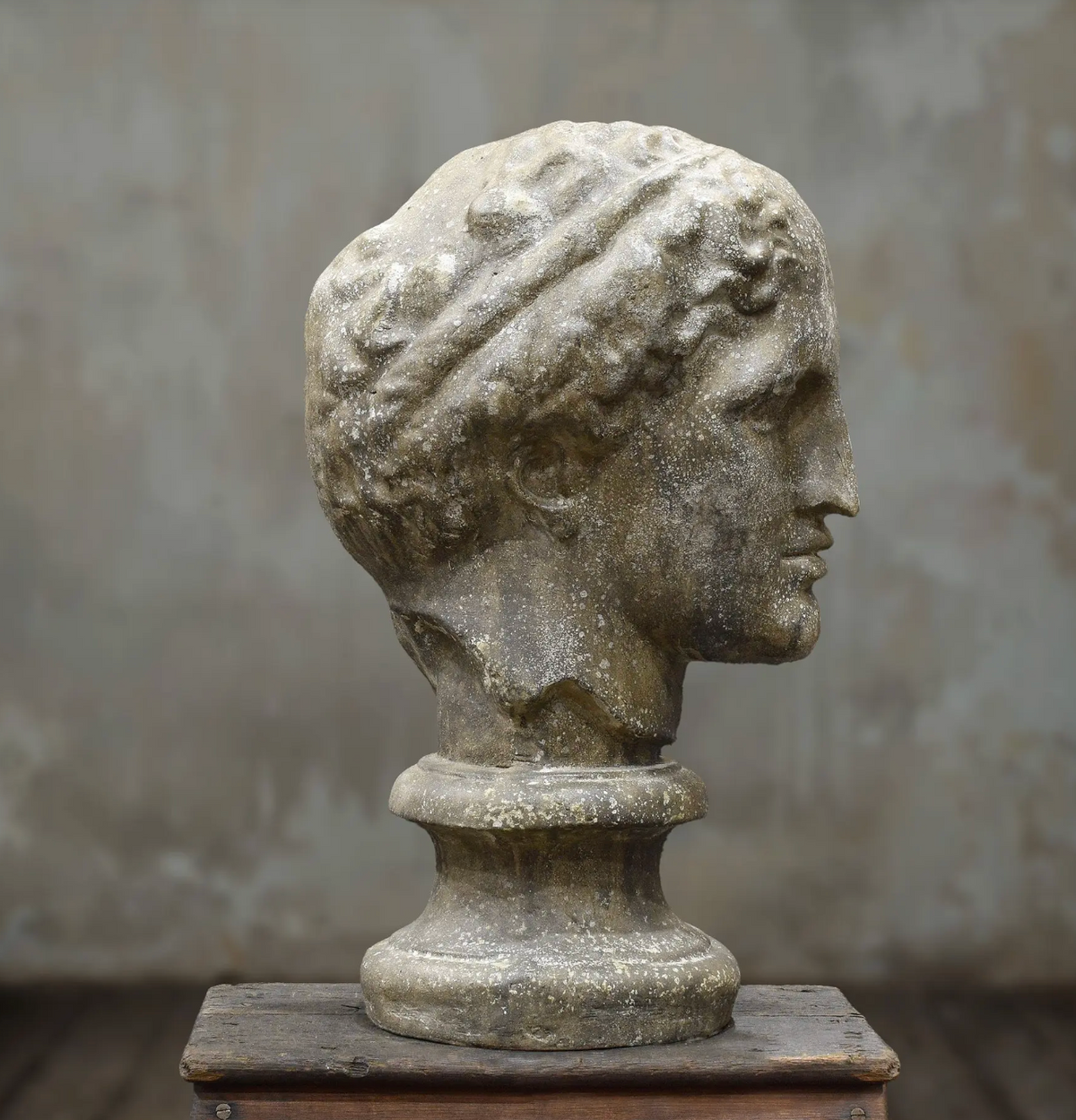 Side profile of classical female cement bust