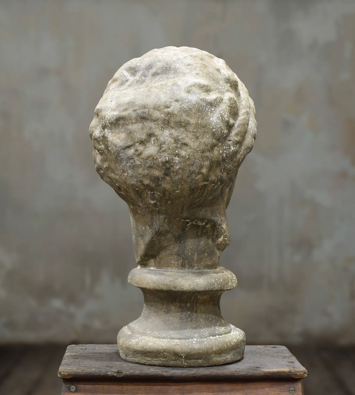 Close-up of classical female bust face and aged finish